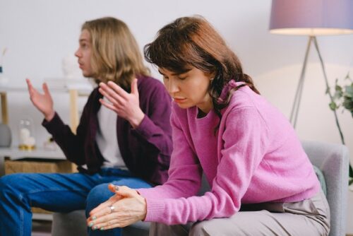 couple arguing on couch